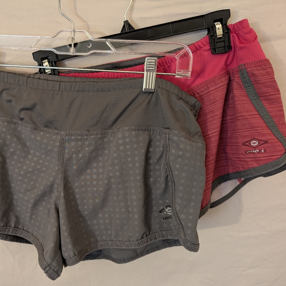 Two Pairs Of Umbro Women's Running Shorts